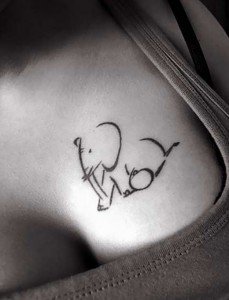 Baby-Elephant-Tattoo-on-Brest-520x679
