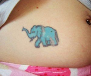 Elephant-Tattoo-Design-for-Female-Stomach-520x433