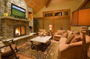 Comfortable-Living-Room-with-Custom-Fireplace-and-Masonry-520x346