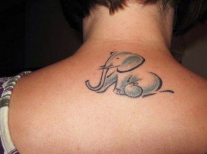 Cute-Elephant-Tattoo-for-Female-Back-Neck-520x390